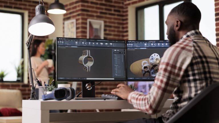 Male engineer working on CAD design illustrates blog "Technical Drawing vs CAD: A Practical Comparison"