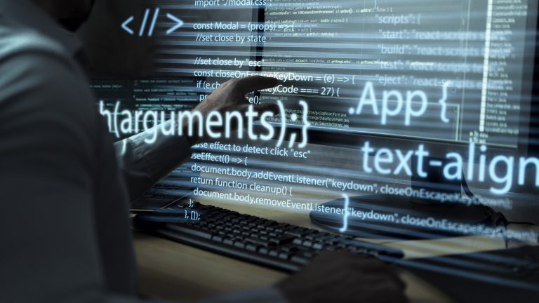 Photo of person coding illustrates blog