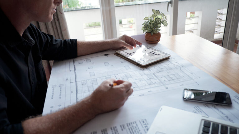 Engineer reviewing CADD drawings for California Title 24