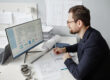 Engineer performing quality assurance drafting review on technical documents